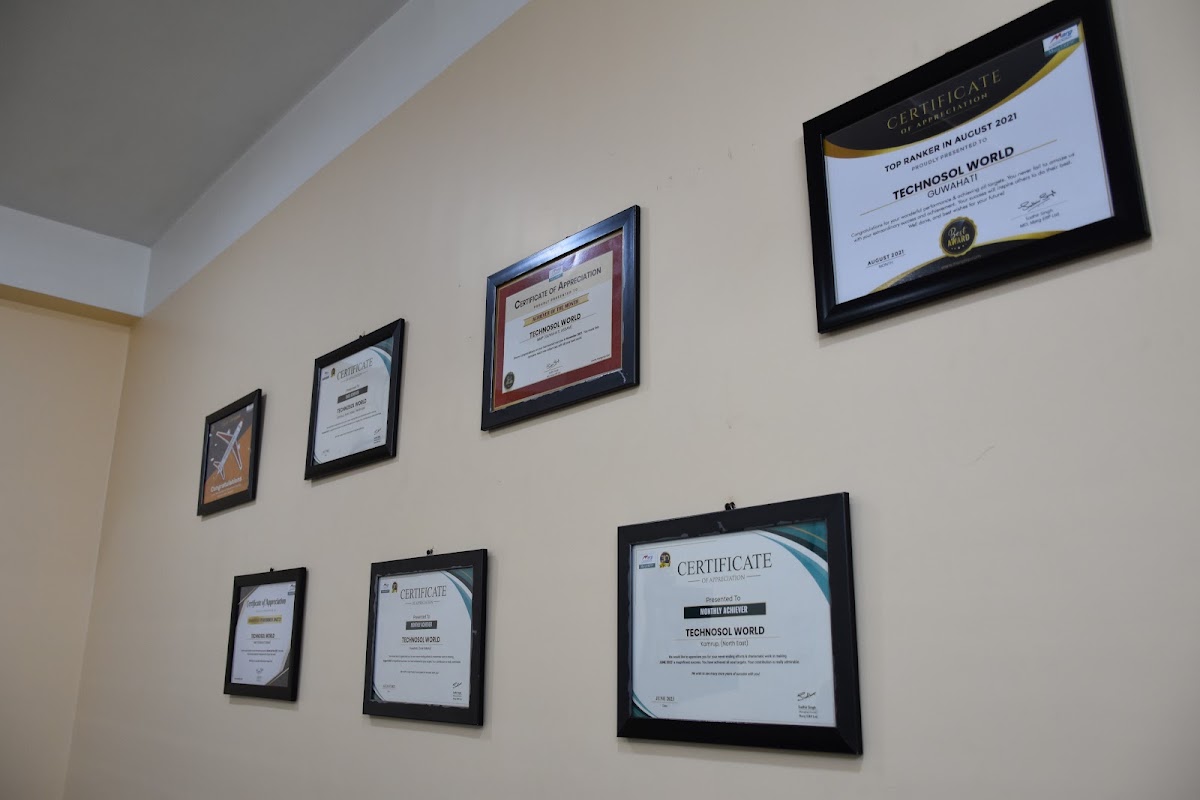 Certificates of appreciation from Marg ERP on our office wall